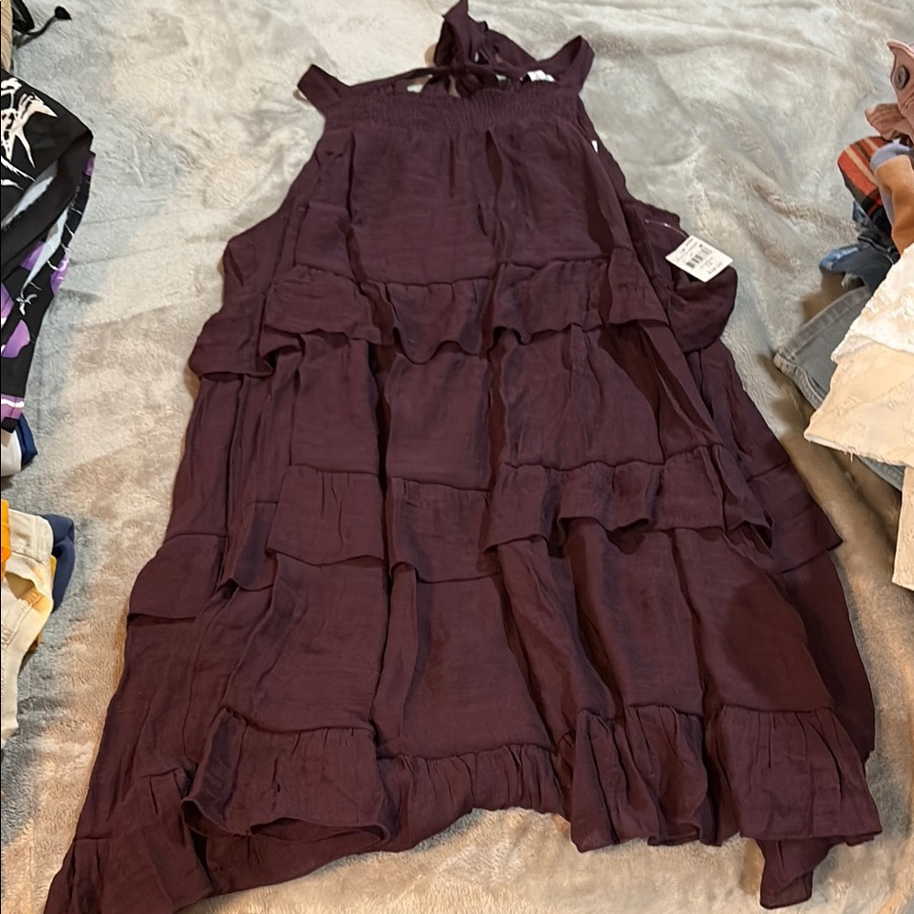 Woman’s purple dress